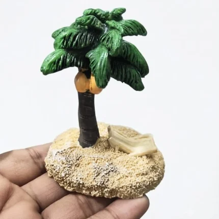 Miniature beach island scene product with tiny palm tree, sandy beach, and clear blue water, ideal for display.