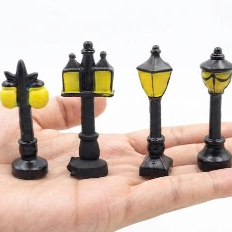 Miniature-Black-Street-Lamp-Post-Figurine-Set-of-4 Miniature black street lamp post figurine, an excellent product for dollhouse, diorama, or miniature scenes.