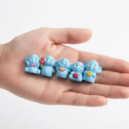 Charming miniature blue elephant figurine product, randomly selected, adds unique touch to any collection.