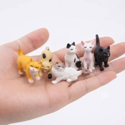 Charming miniature cat figurine product in assorted colors, ideal for dollhouse scenes or miniature collections.