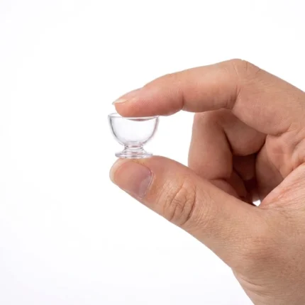 A charming miniature plastic ice cream bowl, perfect as a dollhouse accessory product for tiny scenes.