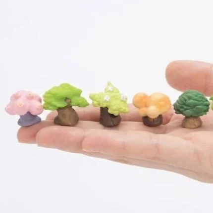 Vibrant miniature colorful tree figurine product, unique for landscapes or dollhouse scenes.