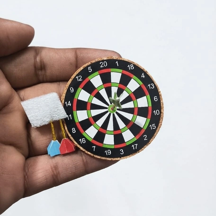 Miniature-Cork-Dartboard-and-Darts-Set Miniature cork dartboard and darts set product, perfect for dollhouse game room scenes.