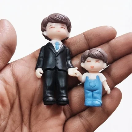 A charming miniature product depicting a father and son, perfect for display or as a unique gift.