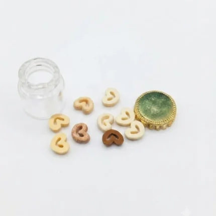 Charming miniature glass jar product with heart-shaped cereal, ideal for dollhouse scenes & tiny food.