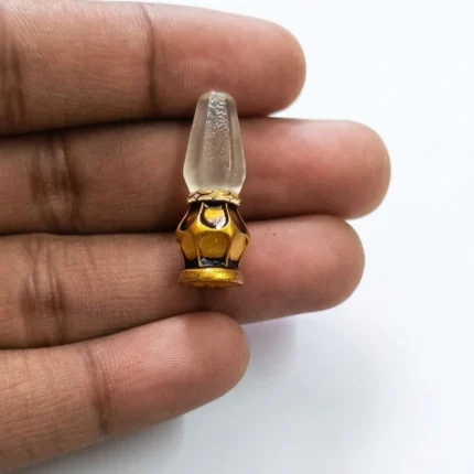 Detailed miniature gold lantern figurine product with clear glass top, ideal for dollhouse scenes.