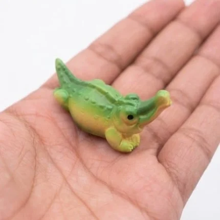 Detailed miniature green crocodile figurine product for collectors and wildlife scenes.