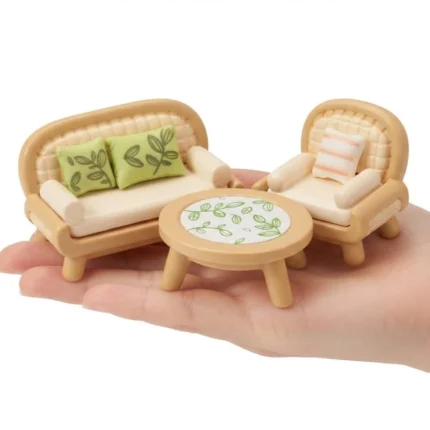 This miniature living room set product features a detailed sofa, chair, and coffee table for dollhouse scenes.