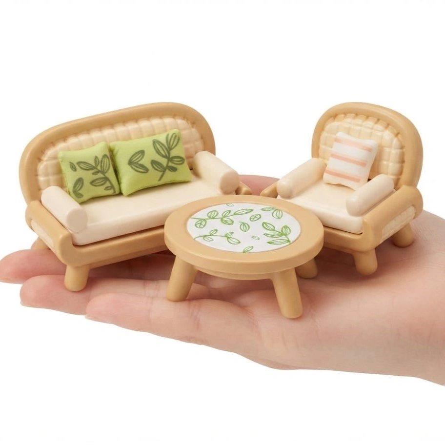 Miniature-Living-Room-Sofa-Chair-and-Coffee-Table-Set This miniature living room set product features a detailed sofa, chair, and coffee table for dollhouse scenes.