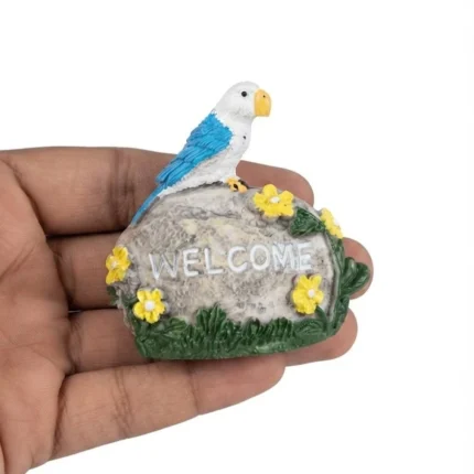 Vibrant miniature parrot figurine on a welcome stone, perfect for enhancing any miniature garden product scene.