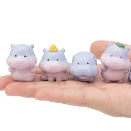 A charming miniature purple hippo figurine product, a random piece perfect for collectors and display.