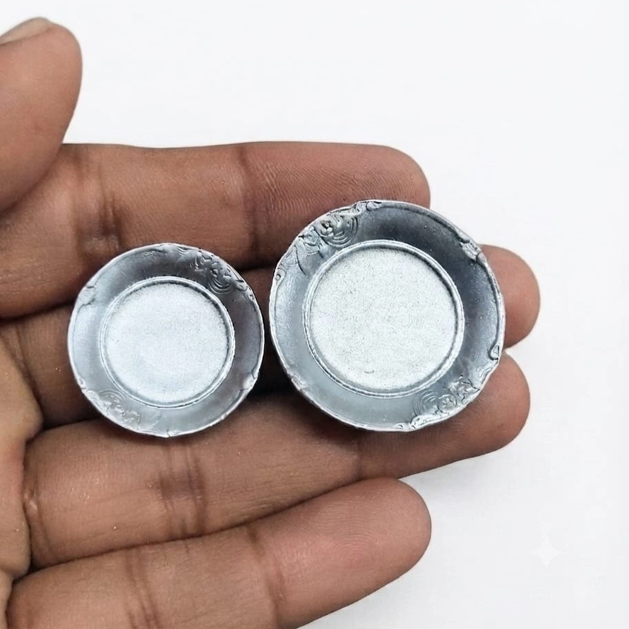 Miniature-Silver-Round-Plate-Set-of-2 Two miniature silver round resin plates, a beautiful product for dollhouse kitchen or dining scenes.