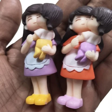 Charming miniature mother and daughter figurine set, a unique random piece product for home decor or gifting.