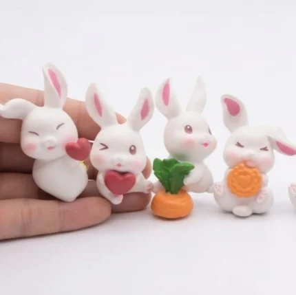 Miniature white bunny figurine, a random piece product, perfect for display or collection.