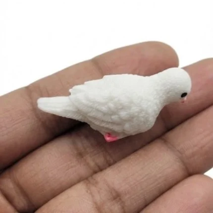 Beautifully crafted miniature white dove bird figurine product, perfect for serene display or collection.