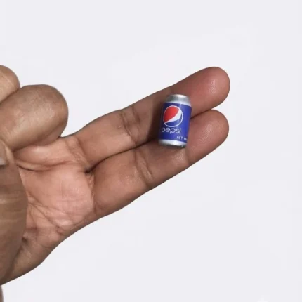 A detailed Pepsi miniature can dollhouse accessory product, perfect for 1:12 scale dioramas and miniature scenes.