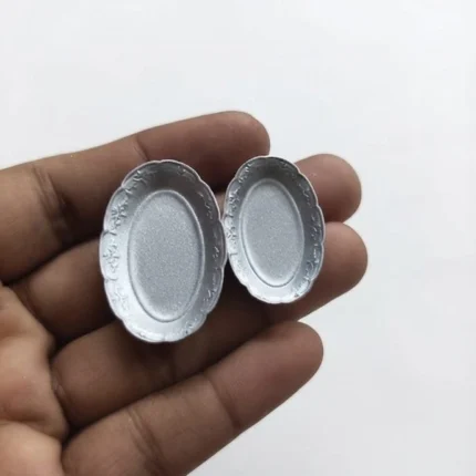Elegant silver miniature oval resin plates (set of 2), a detailed product for dollhouse displays.