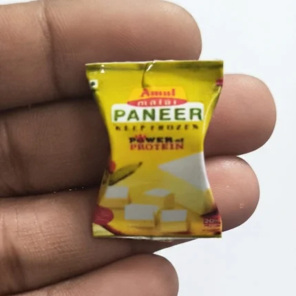 Highly detailed miniature Amul Paneer packet, a realistic collectible product for dollhouse kitchens or dioramas.