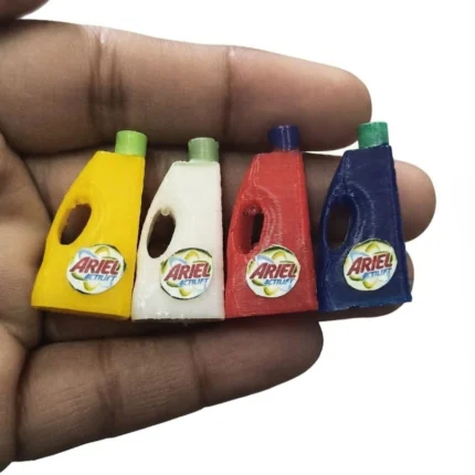 Four highly detailed Ariel detergent miniature bottles, a decorative product for dollhouse scenes or collectors.