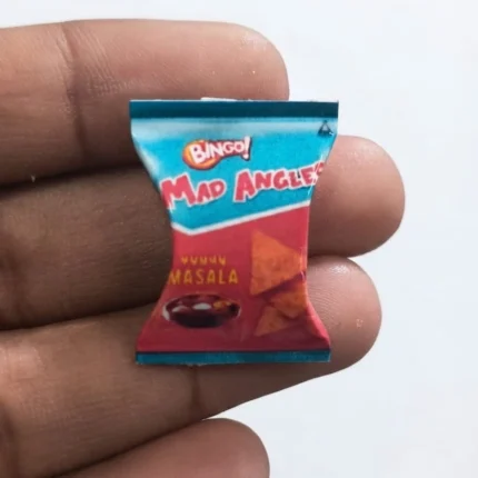 Highly detailed miniature replica product of Bingo Mad Angles Masala snack packet for dollhouses and collectors.