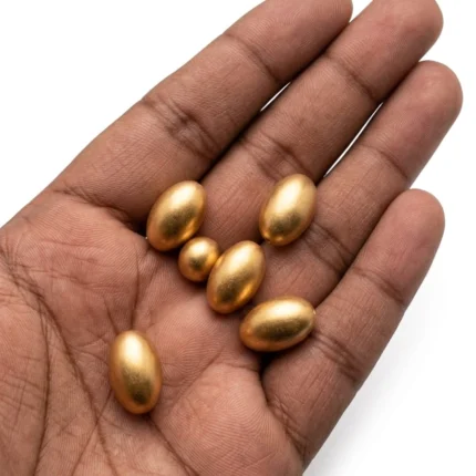 A beautiful miniature gold egg figurine set of 5, perfect for display, showcasing a detailed collectible product.