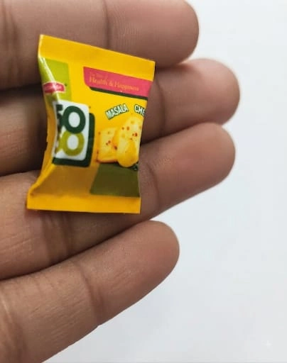 A highly detailed miniature product of Haldirams 80 Masala Snack, perfect for dollhouse displays and collectors.
