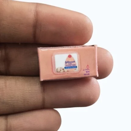 Detailed miniature replica of Johnsons Baby Skincare Wipes Box, a perfect product for dollhouses or dioramas.
