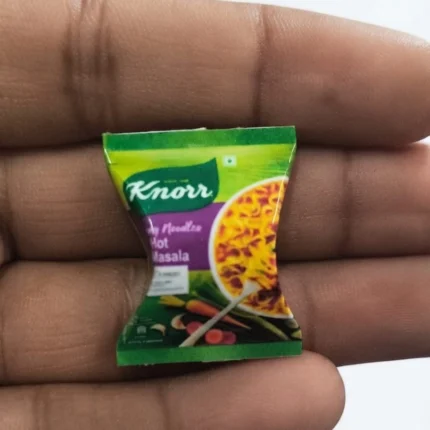 Highly detailed miniature Knorr Hot Masala Noodles Packet, a realistic food product replica for collectors.