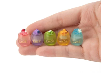 Charming random luck miniature resin fruit jar figurine product, ideal for whimsical display or collection.