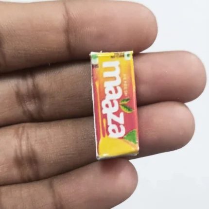 Highly detailed miniature Maaza Mango Juice Tetra Pack product for dollhouse scenes and miniature food collections.