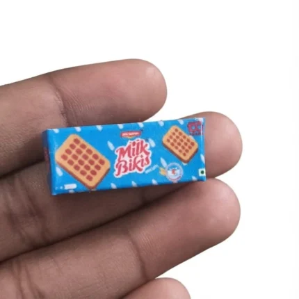 Highly detailed miniature Milk Bikis biscuit pack, a realistic tiny food product for display or dollhouse scenes.