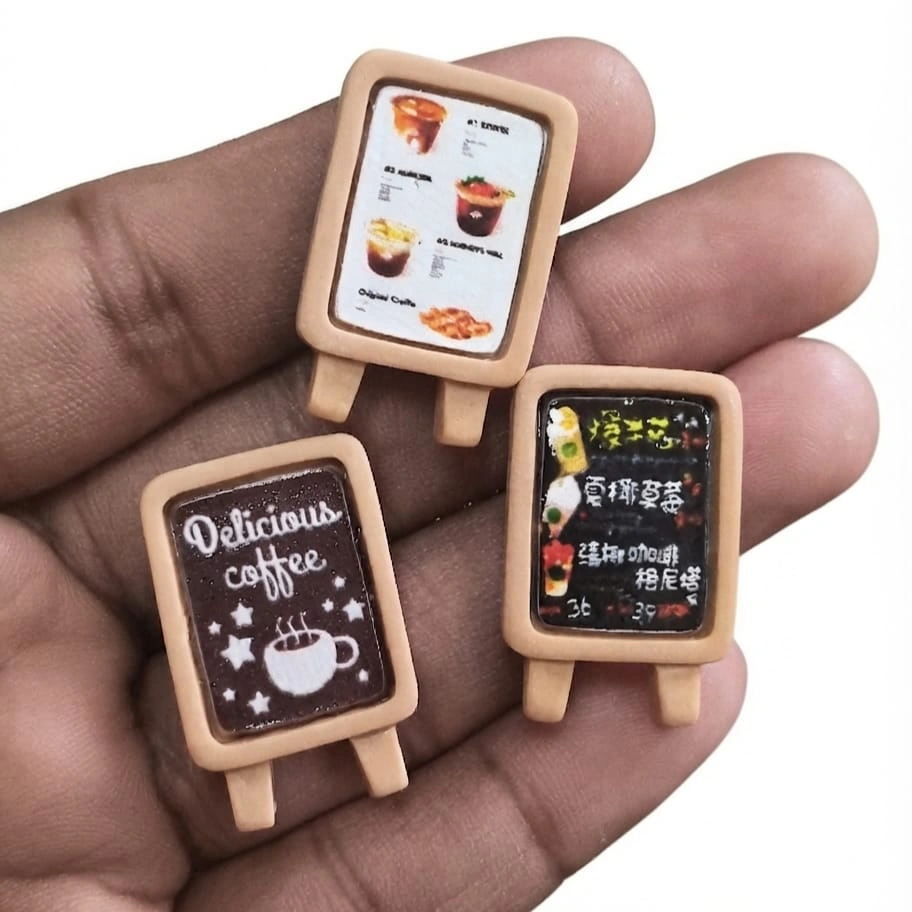 Miniature-Cafe-Menu-Board-Set-of-3 Miniature cafe menu board product with a random design, ideal for dollhouse cafe scenes or dioramas.