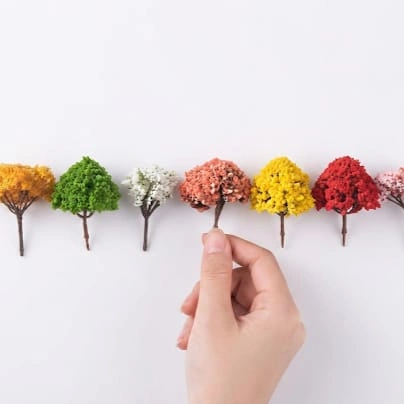 Vibrant miniature colorful tree figurine, a random piece product for enhancing miniature landscapes.
