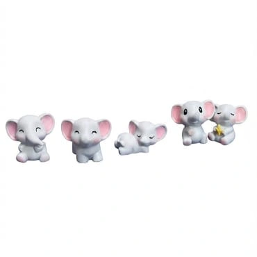 A charming miniature elephant figurine product with a random design, perfect for collectors and home decor.