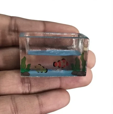 Highly detailed miniature fish tank aquarium with a vibrant clownfish, a decorative product for collectors.