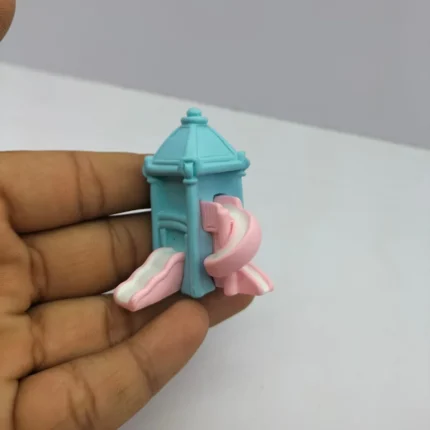 Miniature gazebo playset product with pink slide, ideal for dollhouse gardens or miniature scenes.