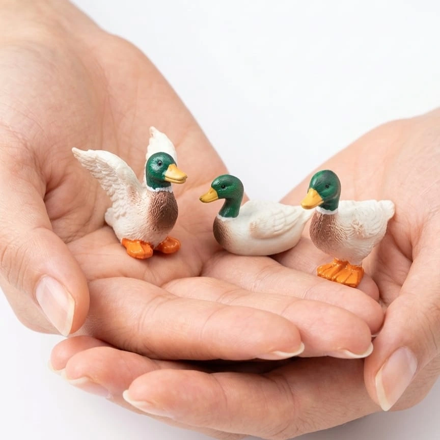 Miniature-Mallard-Duck-Figurine-Set-of-3 Detailed miniature mallard duck figurine, randomly selected, highlighting the craftsmanship of this product.