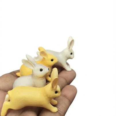 Miniature rabbit figurine product, randomly selected, perfect for dollhouse scenes or display collections.