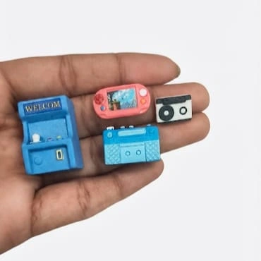 Detailed miniature retro electronics set product for dollhouse scenes or diorama displays, adding vintage flair.