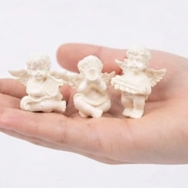 Miniature white angel figurine set of 3, a beautiful product perfect for home decor or as a thoughtful gift.