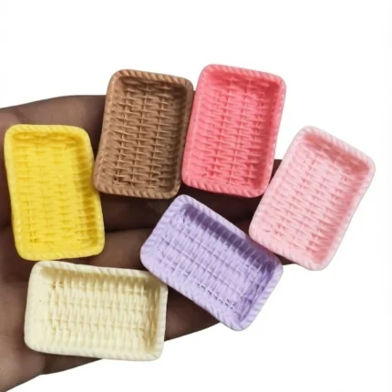 Miniature wicker basket product, randomly selected for unique dollhouse or display. Intricate craftsmanship.