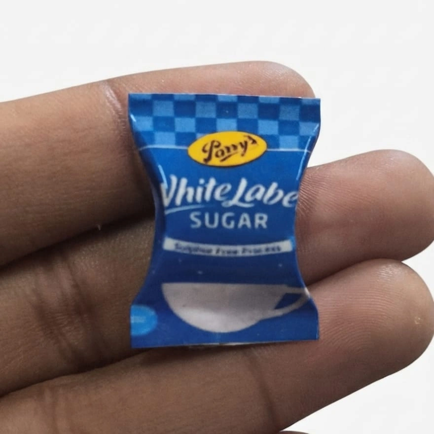 Parrys-White-Label-Sugar-Miniature-Packet Highly detailed miniature product: Parrys White Label sugar packet for dollhouse scenes or miniature food displays.
