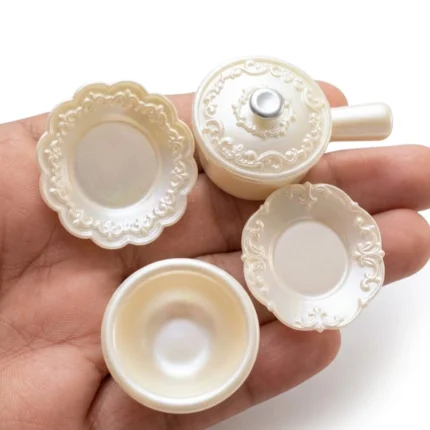Detailed pearl white ornate miniature dinnerware set of 4, a high-quality product for dollhouse dining scenes.