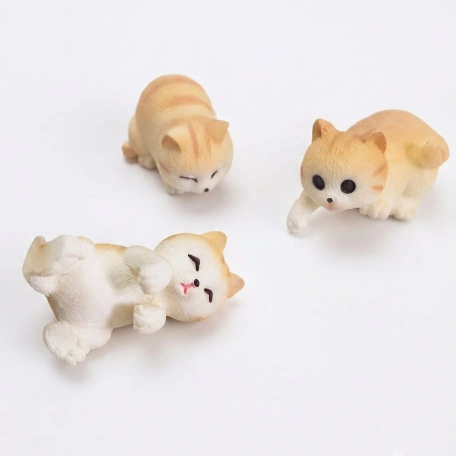 Resin-Tabby-Cat-Figurine-Set-of-3 A charming miniature resin tabby cat figurine product, featuring a random design for a unique collectible.