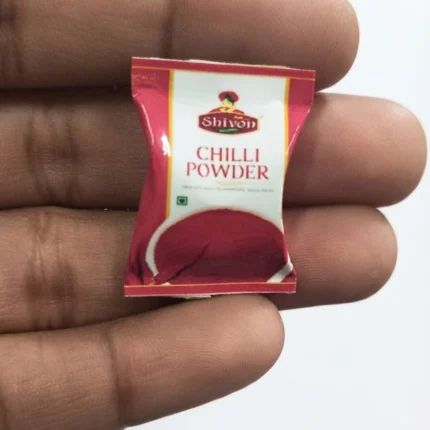 Detailed Shivon chilli powder miniature masala packet product for dollhouse kitchens or miniature food displays.