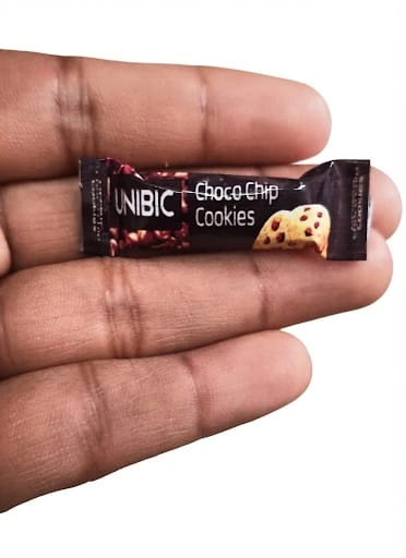 Realistic product image of Unibic Choco Chip Cookies miniature pack, ideal for miniature food collectors.