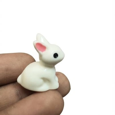 Detailed white miniature rabbit figurine, Type 2, a decorative product for dollhouse scenes or dioramas.