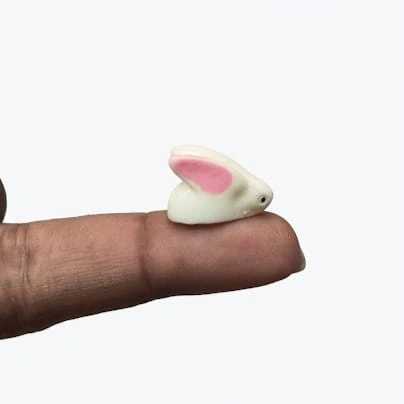 A detailed white miniature rabbit figurine, type 3, perfect for dollhouse scenes or as a collectible product.