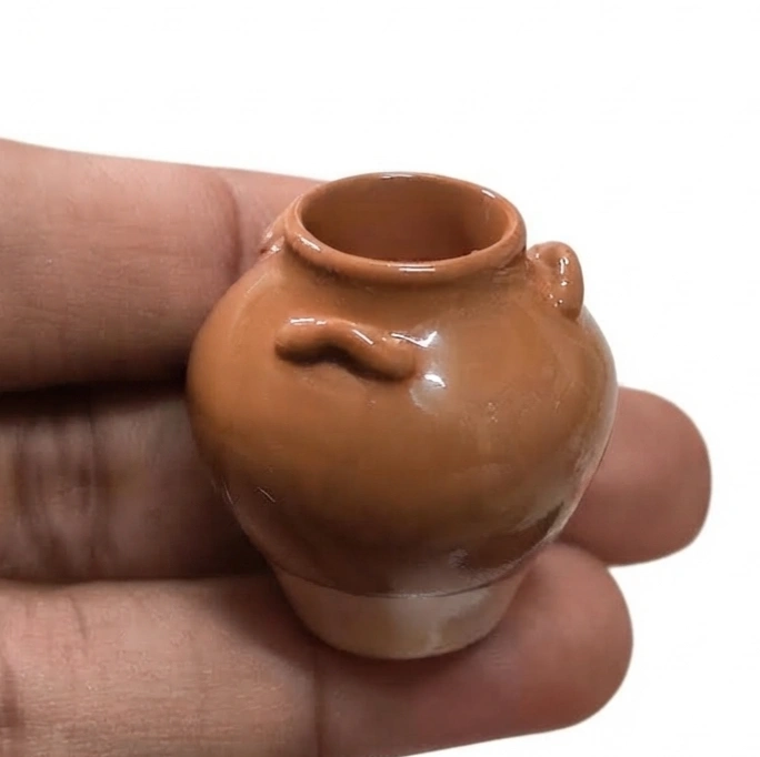 Miniature-Brown-Ceramic-Decorative-Jar Miniature brown ceramic decorative jar product, a charming accent for dollhouses or tiny displays.