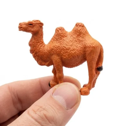 A finely detailed miniature camel figurine product, perfect for adding a desert theme to any collection or diorama.